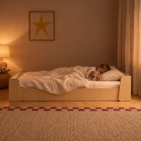 Child asleep in the Tumbleroot Story Nook Bed at night